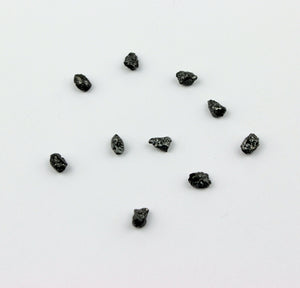 1 x schwarzer Rohdiamant gebohrt